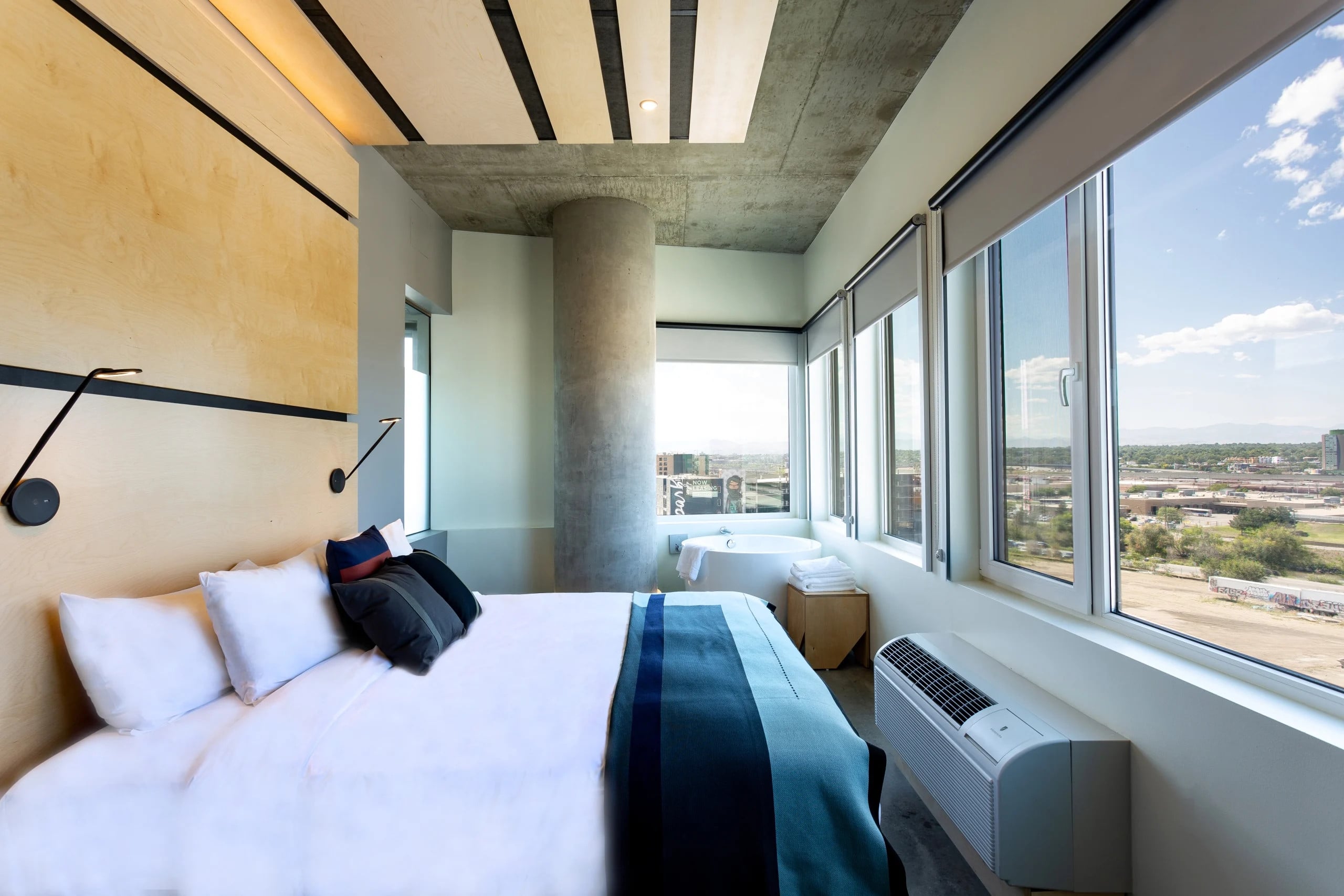 TheSourceHotel_Accommodations_SuiteSkyline_Bedroom